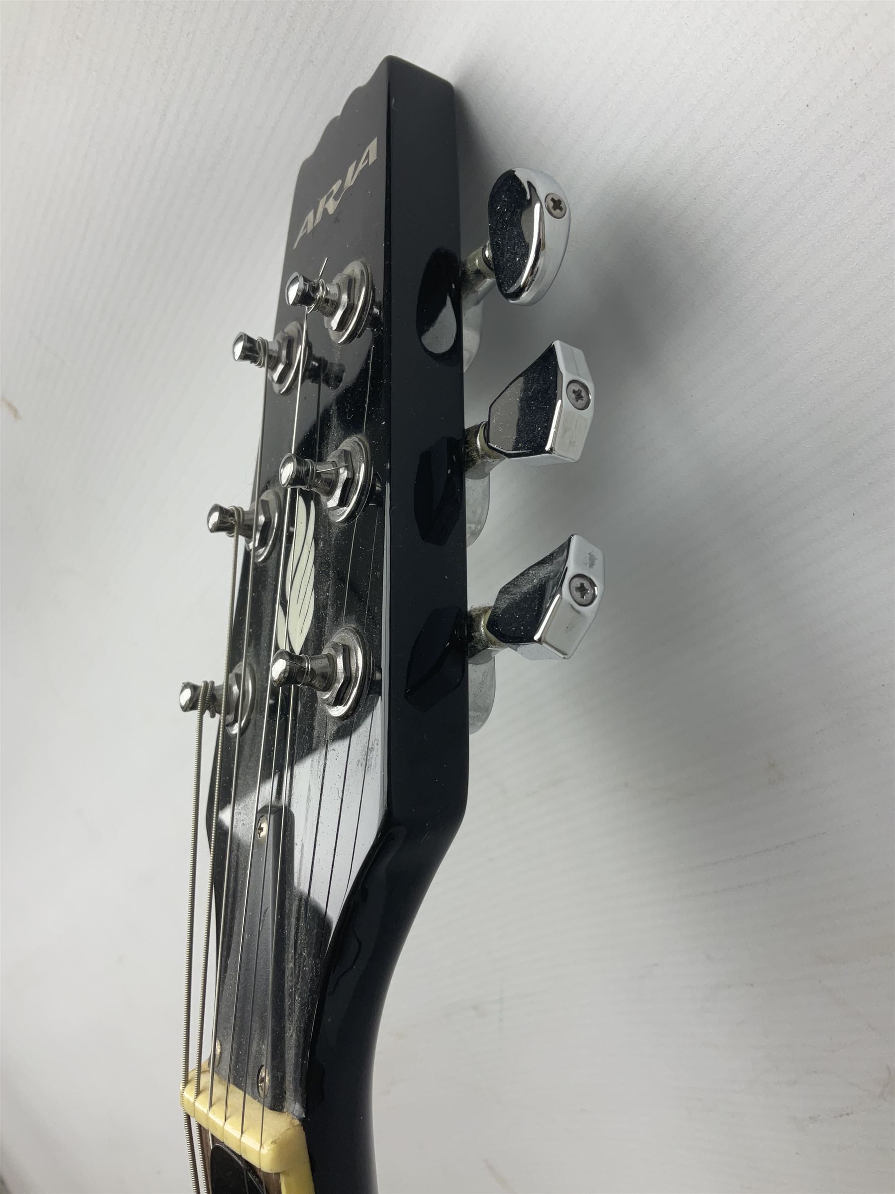 Aria Les Paul style electric guitar, no.037704CH L102cm; with amplifier, soft carrying case and stand; together with various guitar songbooks etc