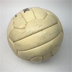 Leather football signed by various Leeds United players from the 1970s including Joe Jordan, Norman Hunter, Johnny Giles, Paul Reaney, Gordon McQueen, Peter lorimar, Eddie Gray, Trevor Cherry, Allan Clarke, Billy Bremner, Terry Yorath etc. 