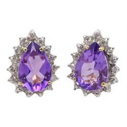 Pair of 9ct gold pear shaped amethyst and diamond stud earrings, stamped 375