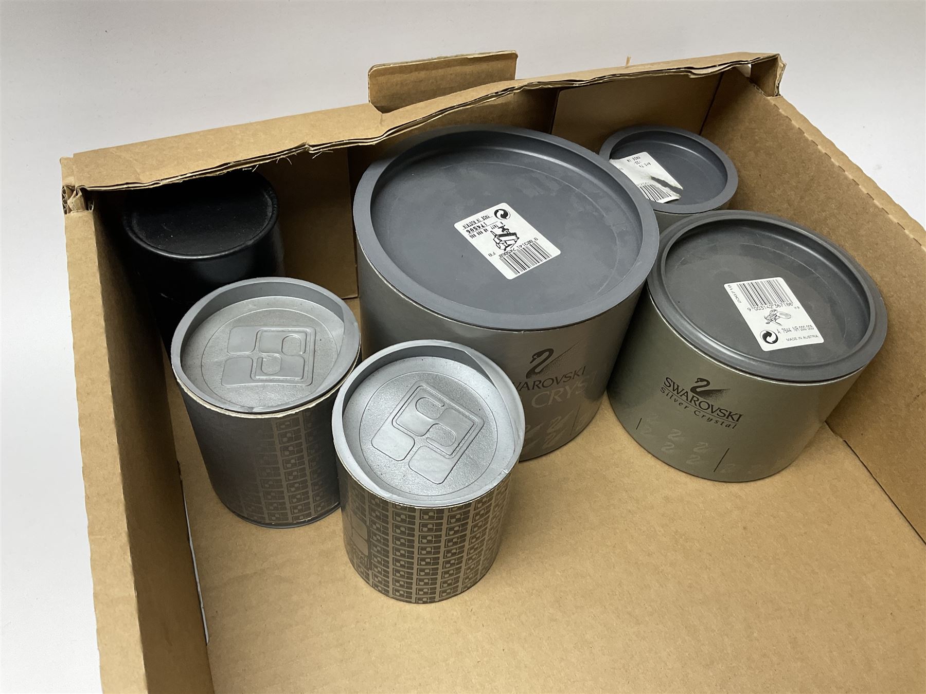 Six Swarovski crystal models, comprising an example modelled as a  Siamese fighting fish, two examples modelled as oyster shells with pearls, another modelled as a piano, plus a York Minster paperweight, Beverly Minster paperweight, and a Crystal Reflections model of an owl. 