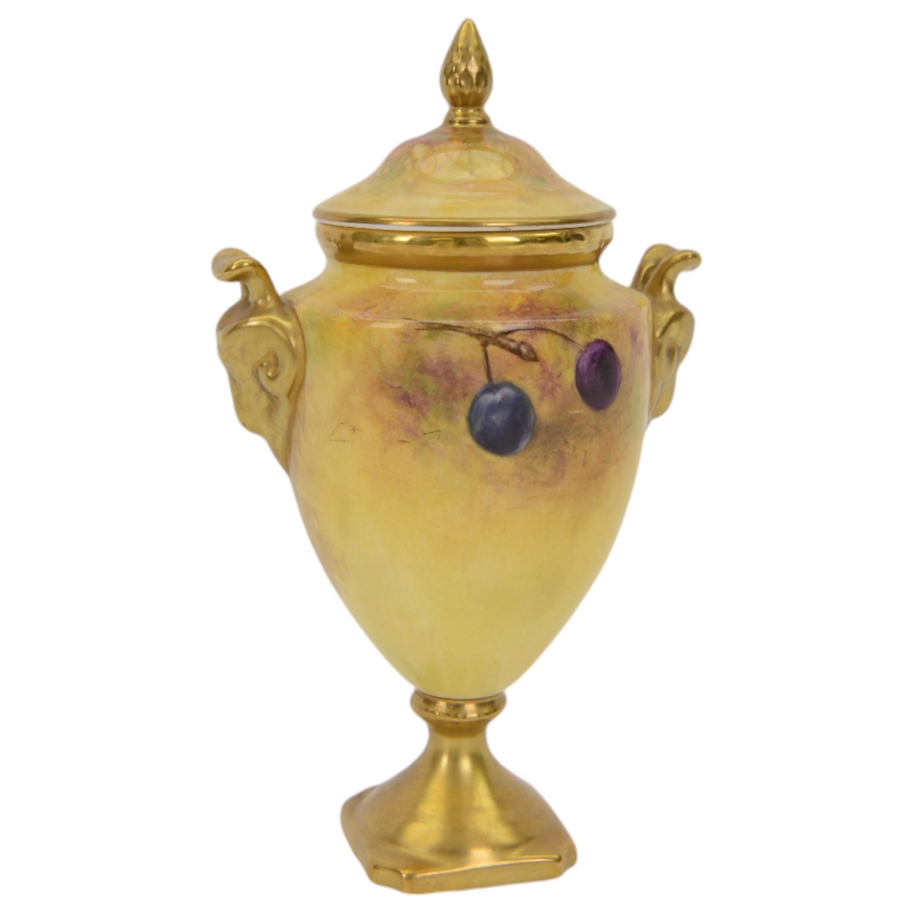 Coalport pedestal vase and cover, of urn form hand painted with fruit with gilt detail, signed J Mottram, H18cm