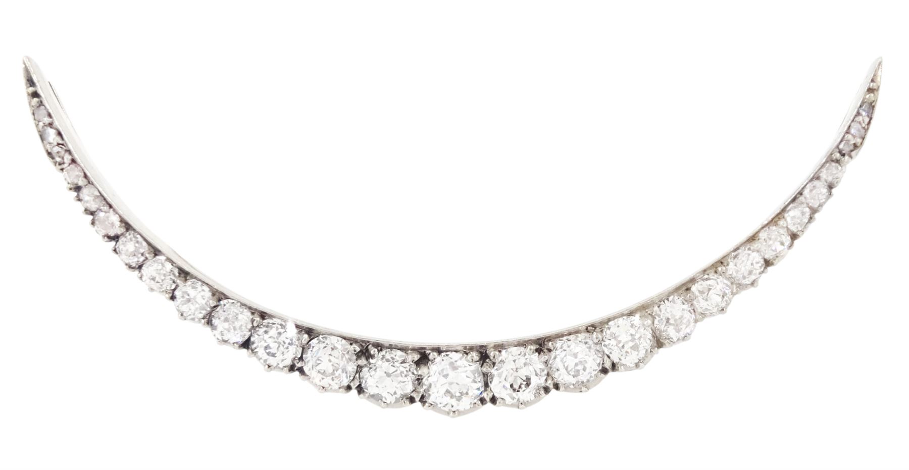 19th century silver and gold diamond crescent moon brooch, set with twenty-one graduating old cut diamonds and six rose cut diamonds, total diamond weight approx 2.00 carat