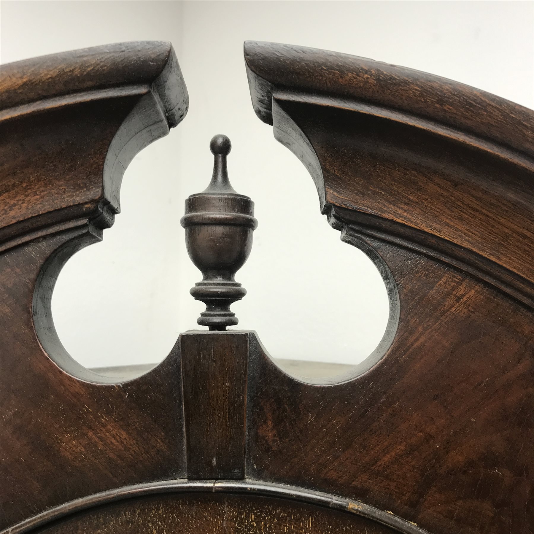  20th century walnut corner cabinet, arched swan neck pediment with central finial, single glazed door, two shelves, cupboard door, shaped bracket supports, W69cm, H191cm, D38cm  