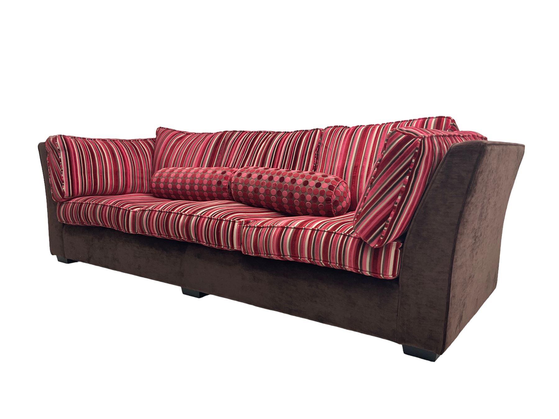 Collins & Hayes - grande three seat sofa upholstered in chocolate fabric, the loose cushions upholstered in textured fuschia stripes with contrasting spotted bolster cushions