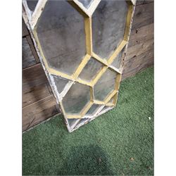 Four 19th century cast iron windows, lattice glazed in white painted finish, 