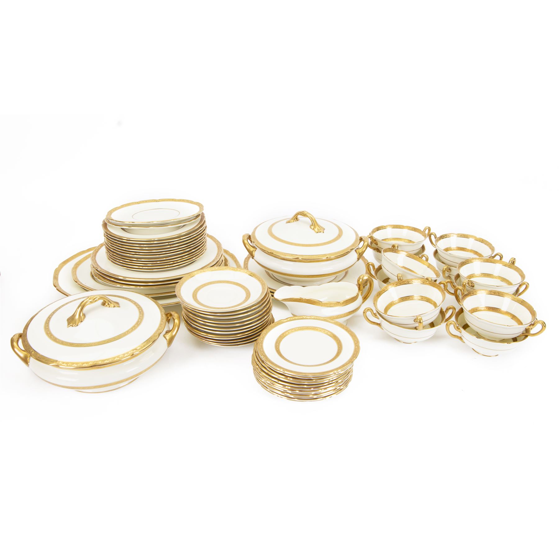 Royal Doulton 'The Balmoral' pattern dinner service for twelve place settings, comprising dinner plates, soup bowls and saucers, side plates, cake plates, three graduating meat platters, pair of tureens with covers and a pair of sauce boats with saucers, all with printed marks beneath