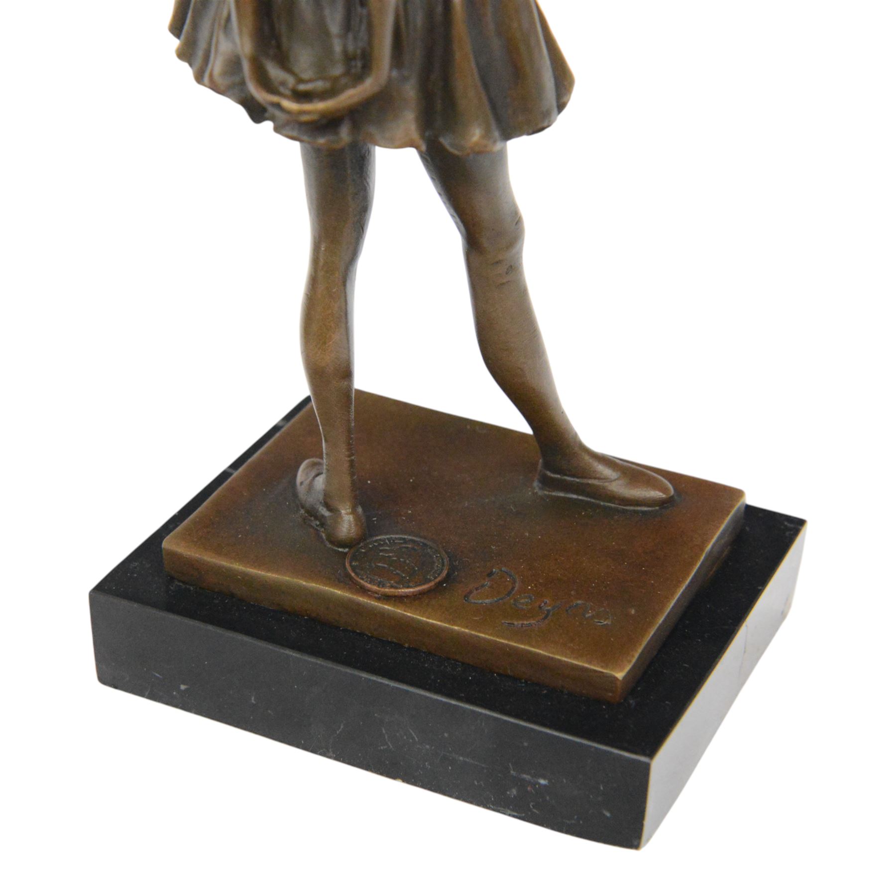 After Edgar Degas, Ballerina bronze figure modelled as a young female dancer, signed Deyas, raised upon a rectangular base, H20cm