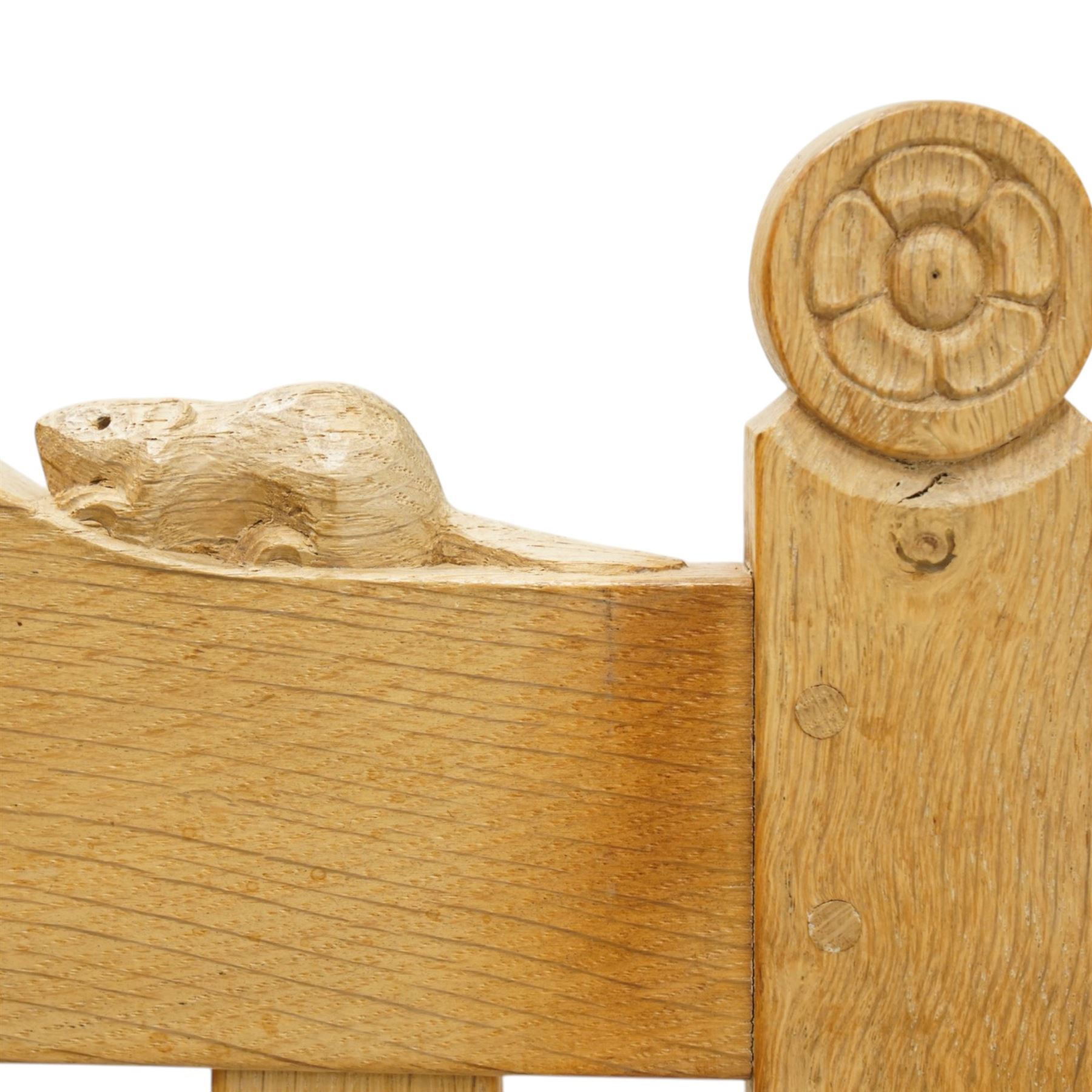 Beaverman - oak 'Ripley' rocking chair with shaped lathe backs and leather seat, with signature Beaver carving to the top rail, flanked by Yorkshire Roses, by Colin Almack of Sutton near Thirsk