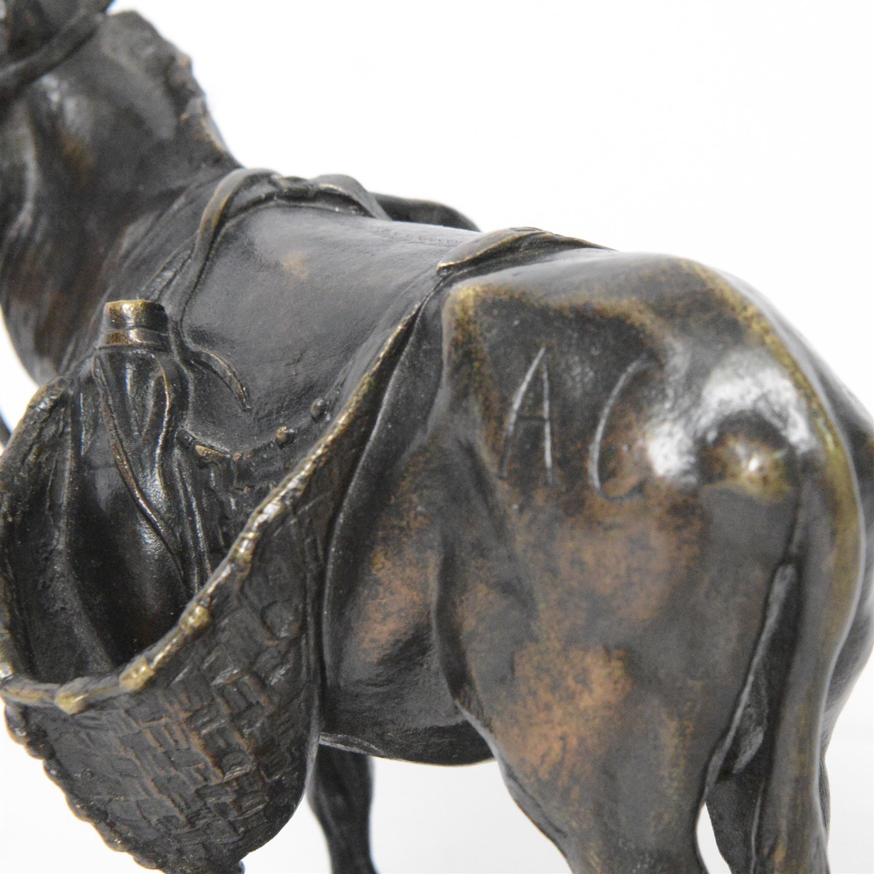 After Auguste Nicolas Cain (French 1821-1894): 'Ane D'Afrique', bronze figure of an African Wild Donkey carrying panniers, upon naturalistically modelled oval base, signed, H14.5cm
