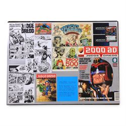 The X Files montage, including cast images, stills and advertisements, within acrylic frame, together with a Judge Dredd montage, including comic cover and comic strips, largest 46x61cm

Notes: This item is from the private collection of Arthur C. Clarke's brother.