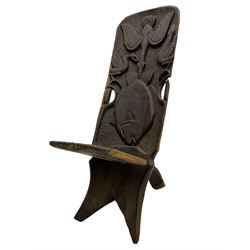 African carved hardwood birthing chair