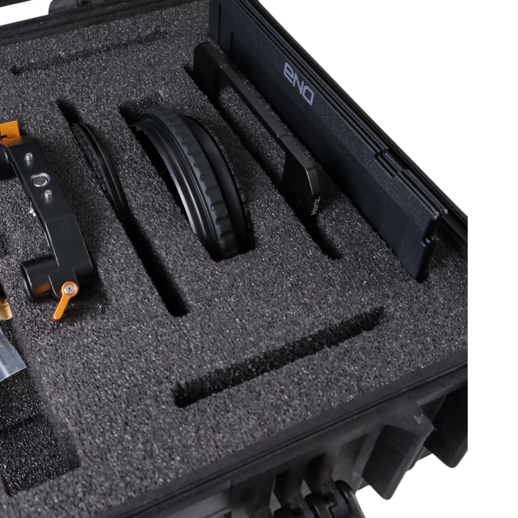 Bright Tangerine Strummer DNA Matte Box with three filter plates, 19mm studio rod holder and 15mm swing away arm, set of five masks, three donuts 138mm, 110mm, 87mm and three top and side flags, contained within a Peli 1550 case