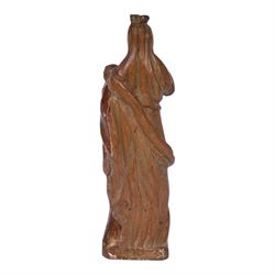 17th century carved limewood figure of a saint, with traces of original gilding, H22.5cm