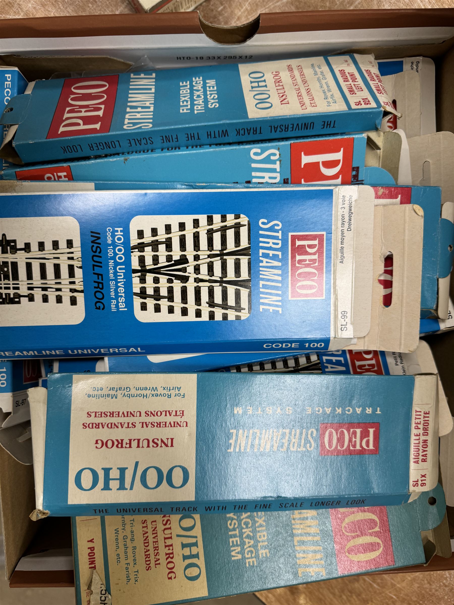 Collection of '00' gauge model railway accessories, including Peco Streamline and Insulfrog track, Metcalfe Platform kit, kit built model railway buildings and other accessories