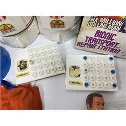 Six Million Dollar Man - two 1975 Bionic Transport and Repair Stations with related figures, further accessories and boxes
