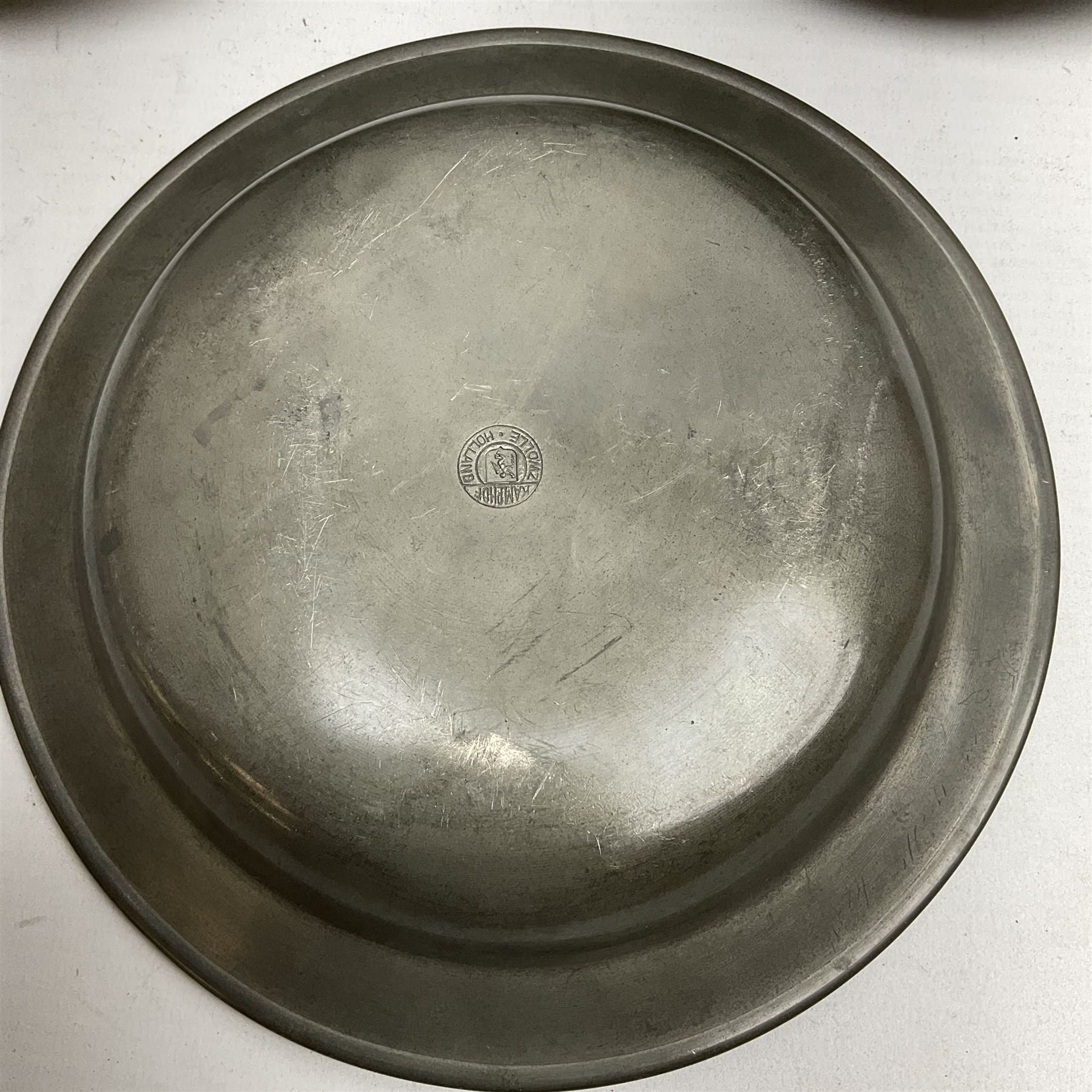 Group of 19th century pewter comprising, set of three H Kamphof Dutch pewter dishes, three other  dishes and two goblets 