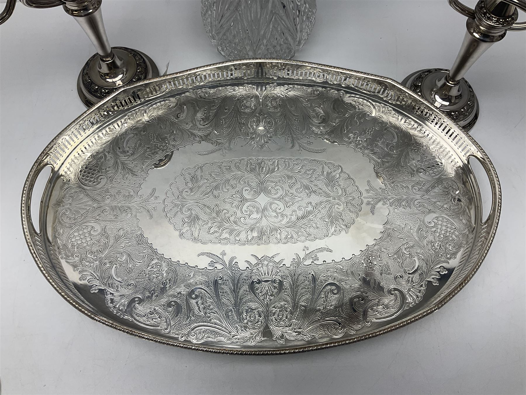 Glass claret jug, with silver plated top, together with other silver plate, to include pair of candelabras and tray with claw feet, jug H30