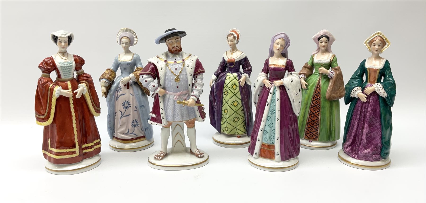 Sitzendorf Henry VIII & his wives porcelain figures, a set of 7 with impressed titles to the reverse, comprising of King Henry VIII, Anne Boleyn, Catherine of Aragon, Catherine Parr, Jane Seymour, Catherine Howard, Anne of Cleves.  