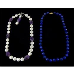 Single strand lapis lazuli bead necklace, with gold clasp stamped 14K and a pearl amethyst necklace bead necklace (2)