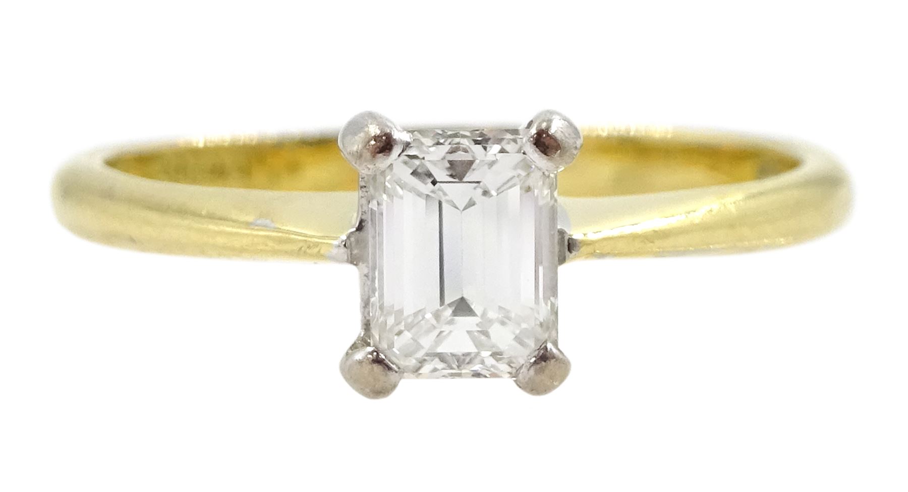18ct gold single stone emerald cut diamond ring, London 2000, diamond approx 0.50 carat
