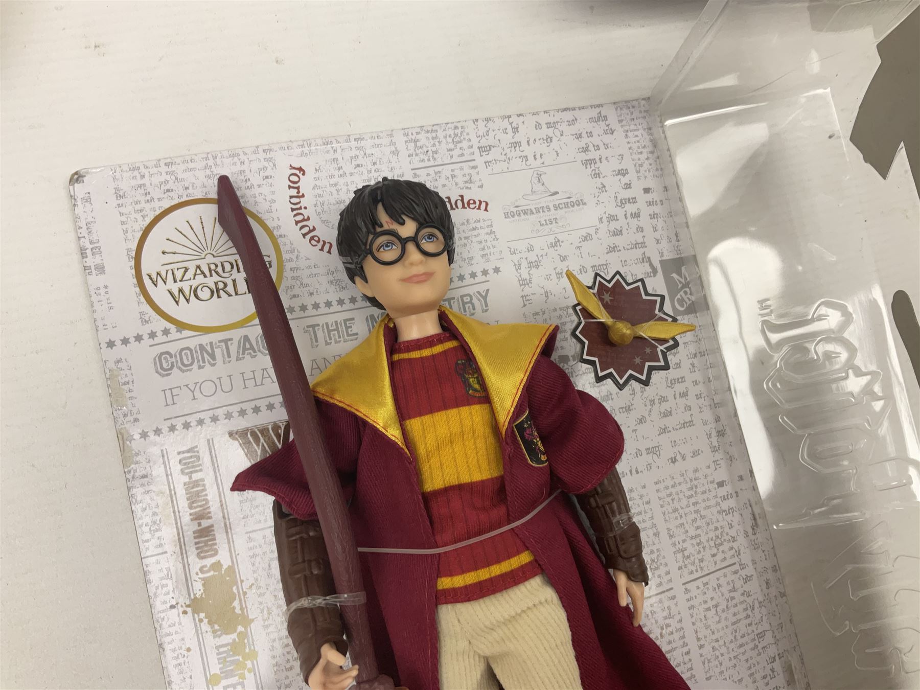 Three Mattel carded Harry Potter dolls - Harry, Hermione & Dumbledore; Vivid Imaginations Take That Robbie doll; all boxed; three Manchester United figures of players (one boxed); and The Simpsons 3-D Chess Game; boxed