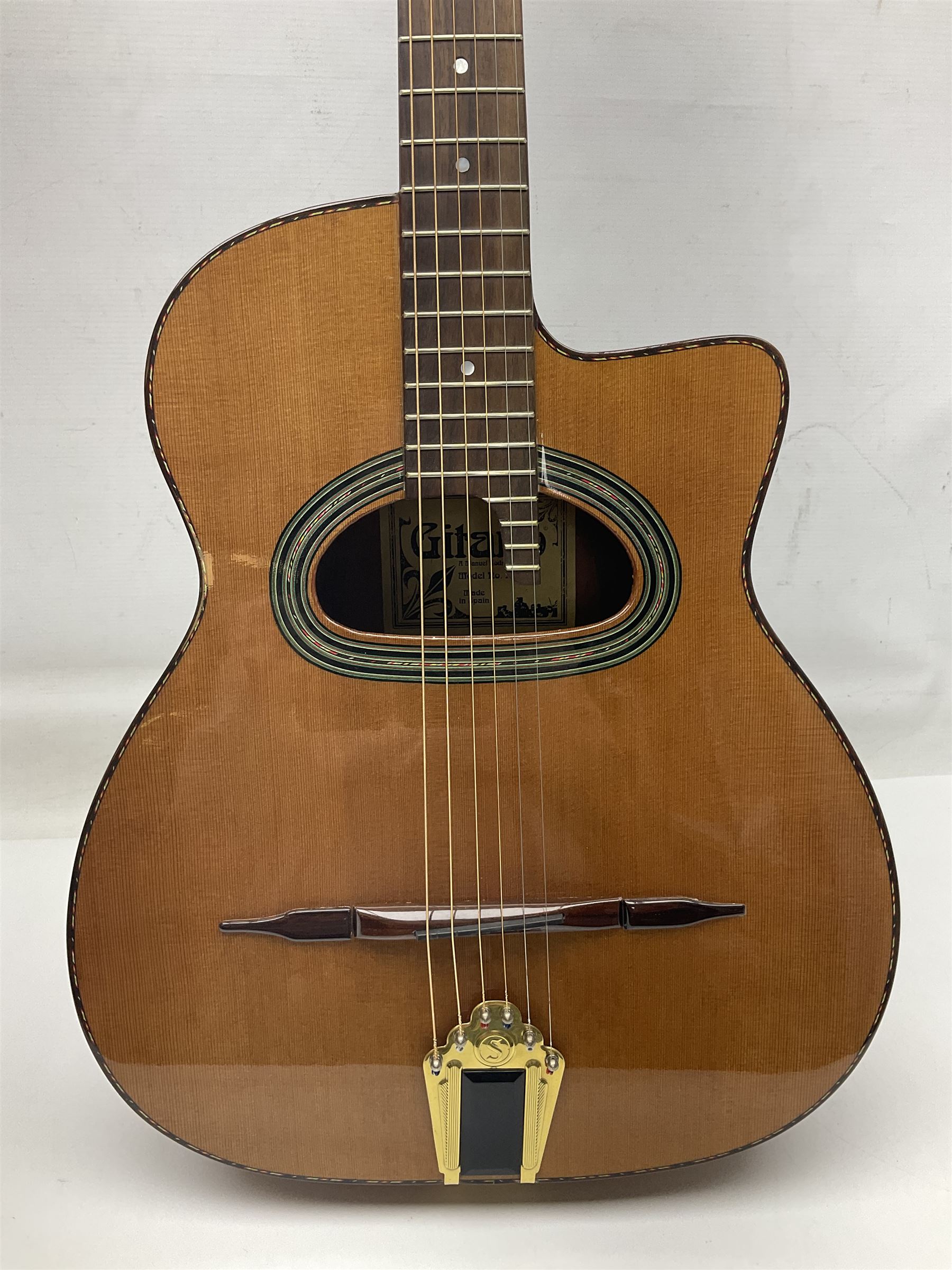 Spanish Gitano Manuel Rodriguez Maccaferri guitar, model no.EMC1; bears label; L98cm; in lightweight carrying case