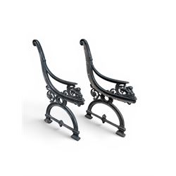 Yates Haywood - pair of 19th century cast iron bench ends, winged griffin detail, arched legs with rope turned decoration, finish in green paint, registration number 206550, first registered 8 March 1867 (see illustration), length as required