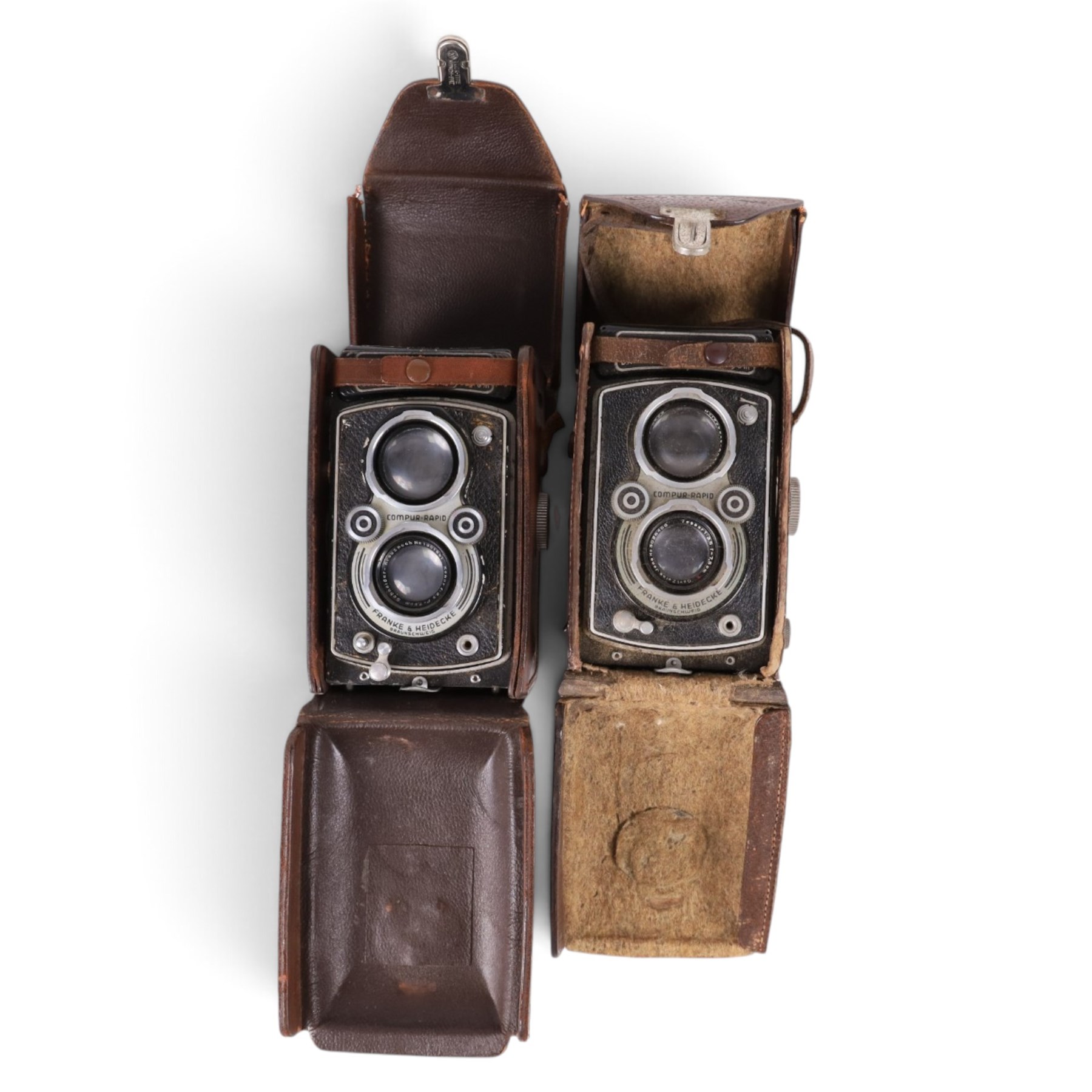 Two Rollei Franke & Heidecke Rolleiflex medium format TLR cameras, one serial no. 1059268 with Compur-Rapid Xenar f:3.5 F=7.5cm Schneider-Kreuznach les serial no. 1901591, the second serial no. 1061648 with Compur-Rapid Carl Zeiss Jena Tessar 1:3.5 F=7.5 lens serial no.3028466, both in leather Rolleiflex cases