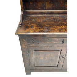 Bylaws of Leominster - 18th century design figured oak dog kennel dresser, the raised plate rack with projecting cornice over hooks and three tiers, moulded rectangular top over three drawers and two panelled cupboards, moulded frame and panelled sides, on stile supports