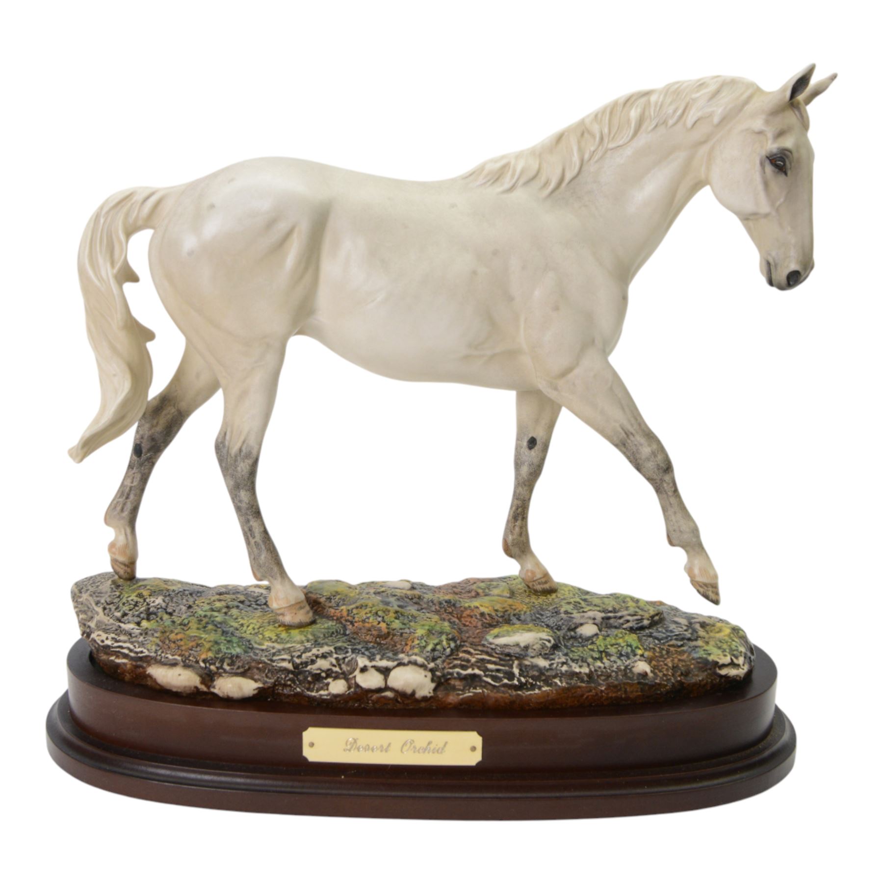 Two Royal Doulton horses, Desert Orchid and Red Rum, on wooden plinths 