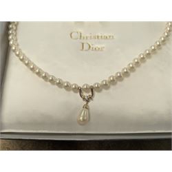 Pair of Christian Dior clip on hoop earrings, stamped Chr.Dior, together with a faux pearl necklace and similar clip on earrings, stamped Grosse, both within Christian Dior boxes