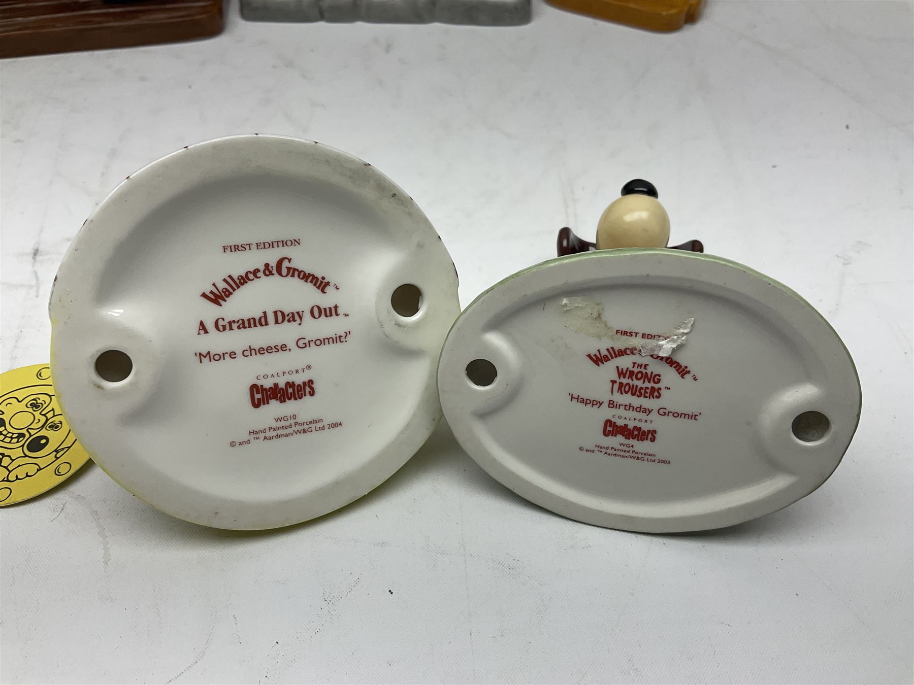 Six Coalport Characters Wallace and Gromit figures, comprising Ready for Takeoff, Woolshop Encounter, Do Something Gromit, Shaun's New Coat, More Cheese Gromit and Happy Birthday Gromit, two with original boxes 