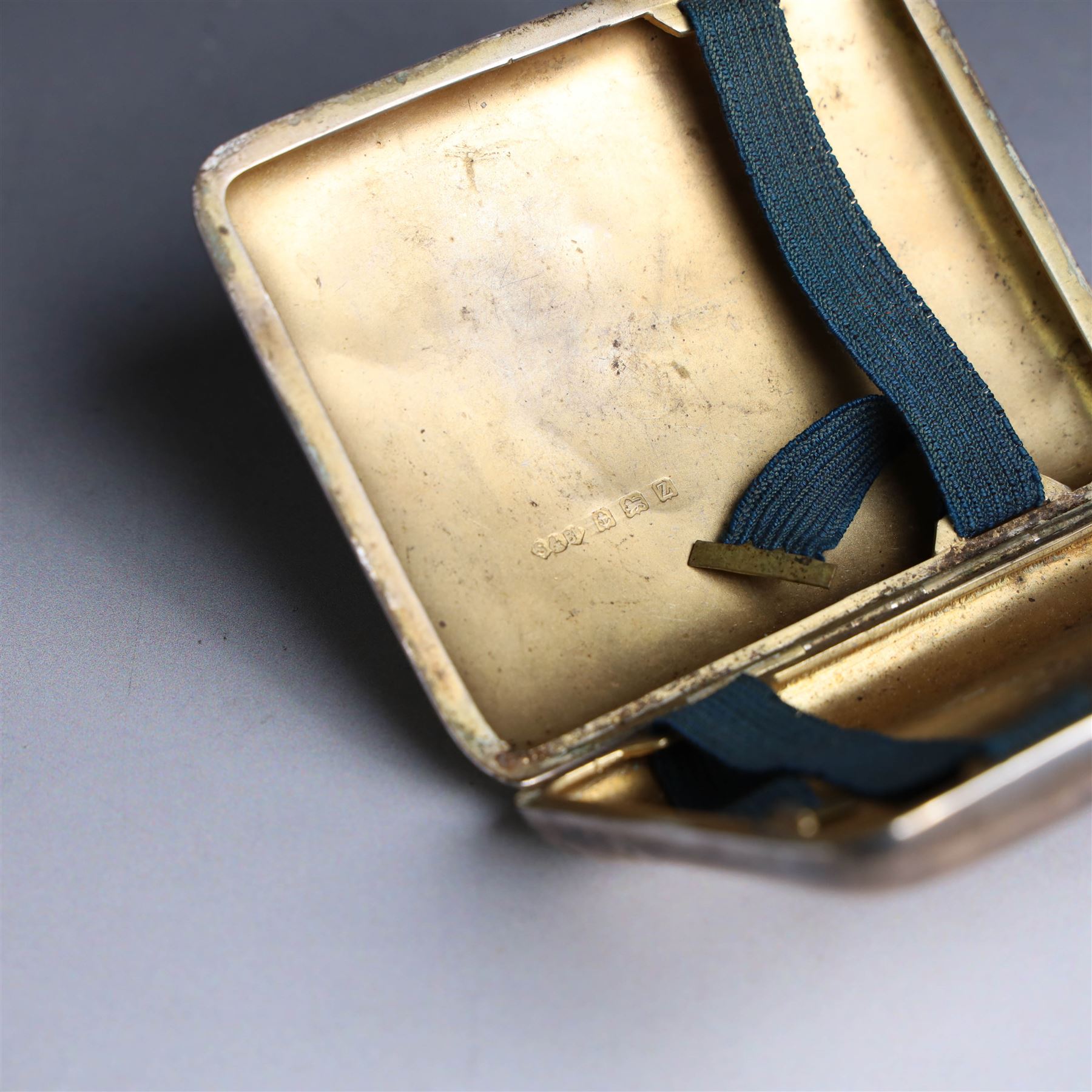 1920s silver cigarette case, with engraved initials and foliate decoration to cover and personal engraving to interior, hallmarked Smith & Bartlam, Birmingham 1924, with a similar silver vesta case, hallmarked, cigarette case H8.5cm