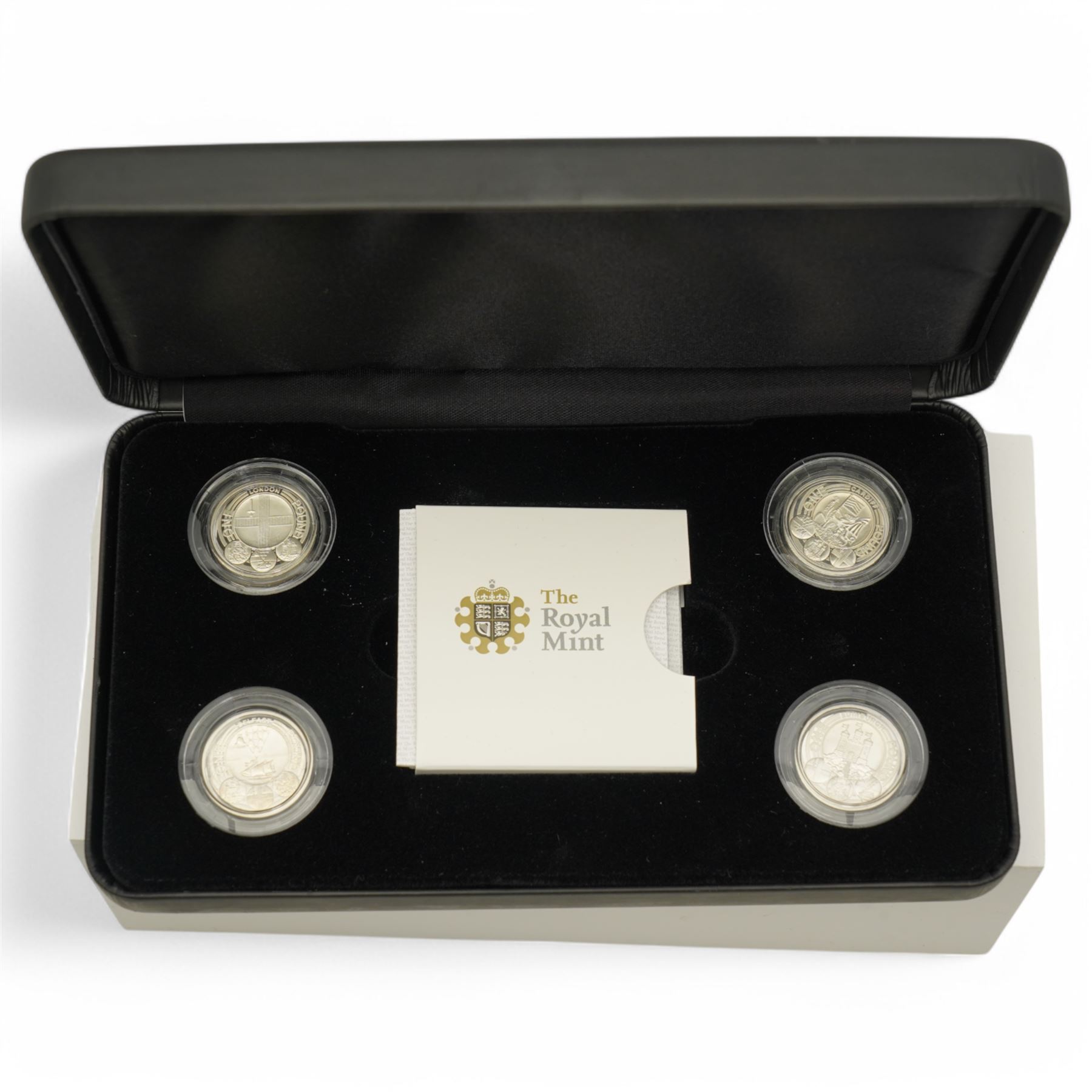 Six The Royal Mint United Kingdom silver proof one pound coins or sets, comprising 2004, 2005, 2006, 2007 'Bridges' four-coin set, 2010 and 2011 'Cities' four-coin set, 2013 'The 30th Anniversary Of The £1 Coin' three-coin set, 2013 and 2014 'Floral' four-coin set, 2016 'The Last Round Pound' and 2017 'Nations of the Crown', all cased with certificates