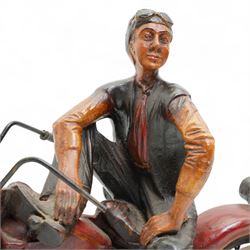 Painted resin model of a figure on a Harley Davidson motorbike, W50cm