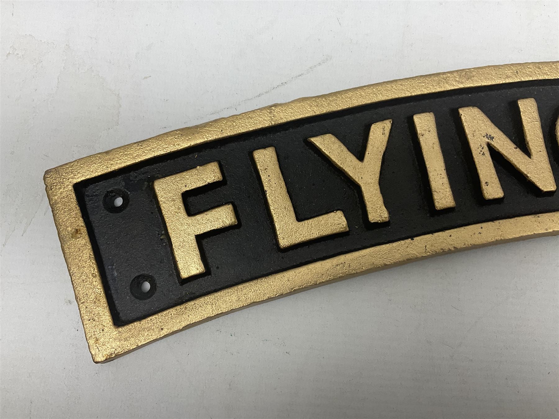 Cast iron Flying Scotsman arched railway type sign, L70cm