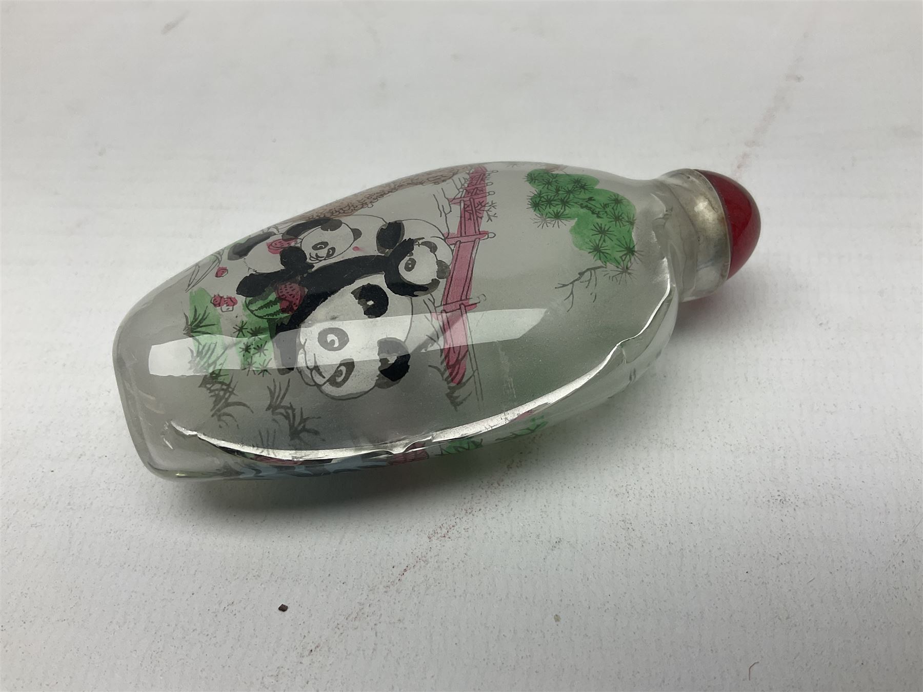 Seven Chinese glass snuff bottles painted with figures and animals, together with three wood mounted bone examples