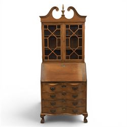 Maddox of Jamestown New York - Georgian design mahogany bureau bookcase, broken arch pediment with central finial, astragal glazed bookcase, above a fall front writing slope with fitted interior, four serpentine drawers, raised on claw on ball feet 