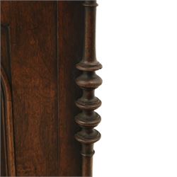 Victorian mahogany low cabinet, shaped rectangular top fitted with two arch panelled doors flanked by turned pilasters, enclosing two shelves and fitted with four short drawers with turned knobs 
