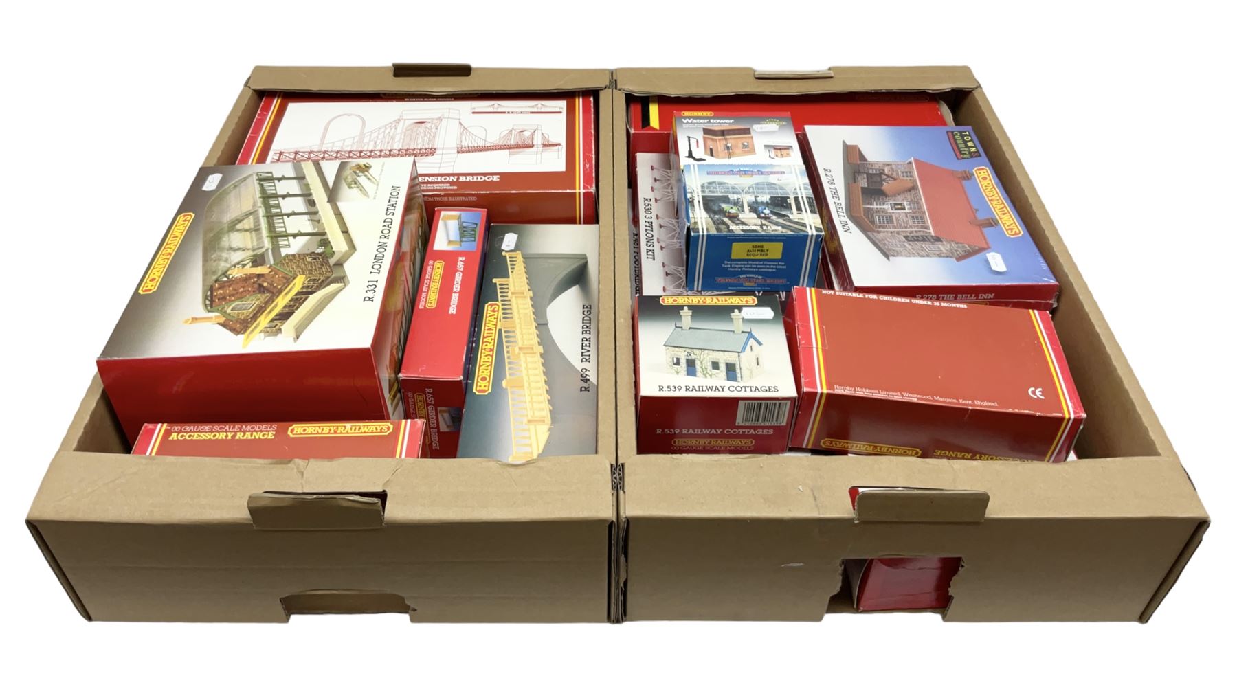 Hornby '00' gauge - nineteen construction kits for trackside buildings and accessories including Grand Suspension Bridge, London Road Station, River Bridge, Viaduct, Engine Shed, Railway Cottages, Water Towers, Girder bridge, Houses, Bell Inn etc; all boxed (19)