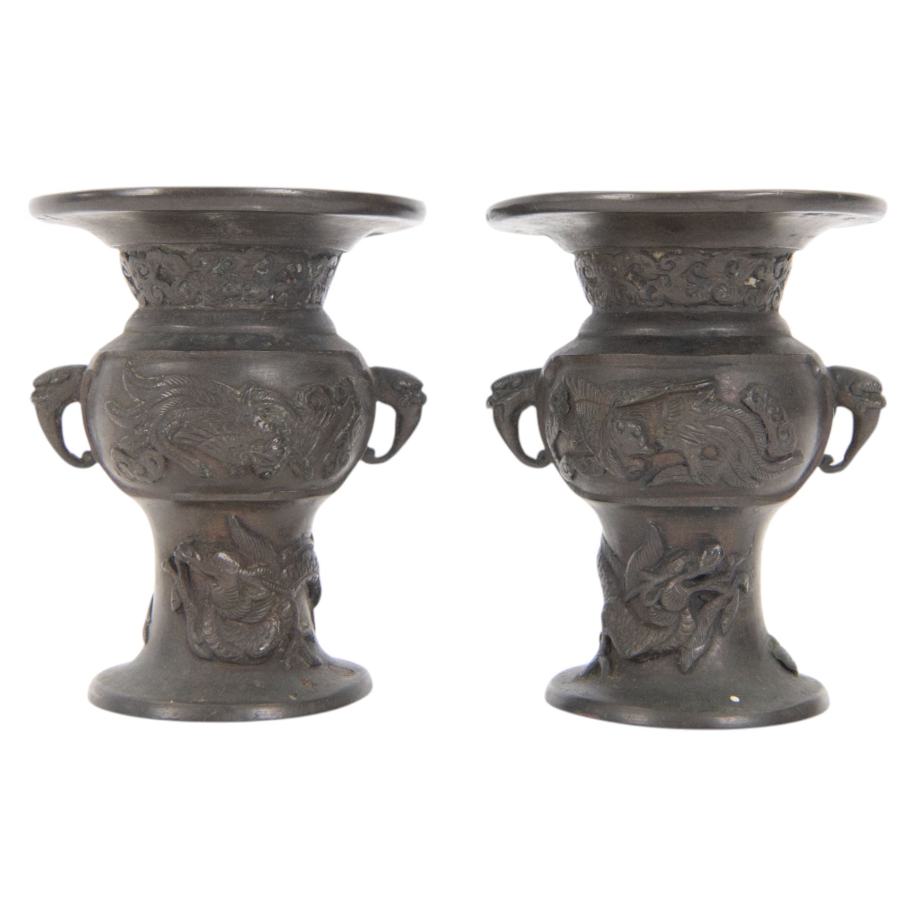 Pair of Japanese bronzed vases, decorated in relief with with birds and dragons, with dragon head handles, H13cm