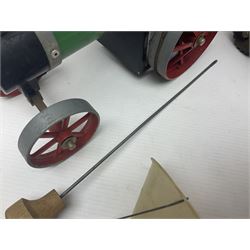 Mamod TE1a steam traction engine with burner, bunker, steering rod and funnel; red and black painted Tri-ang tin-plate Jones KL44 mobile crane; and two Hull Savings Bank Home Safe money boxes; all unboxed (4)