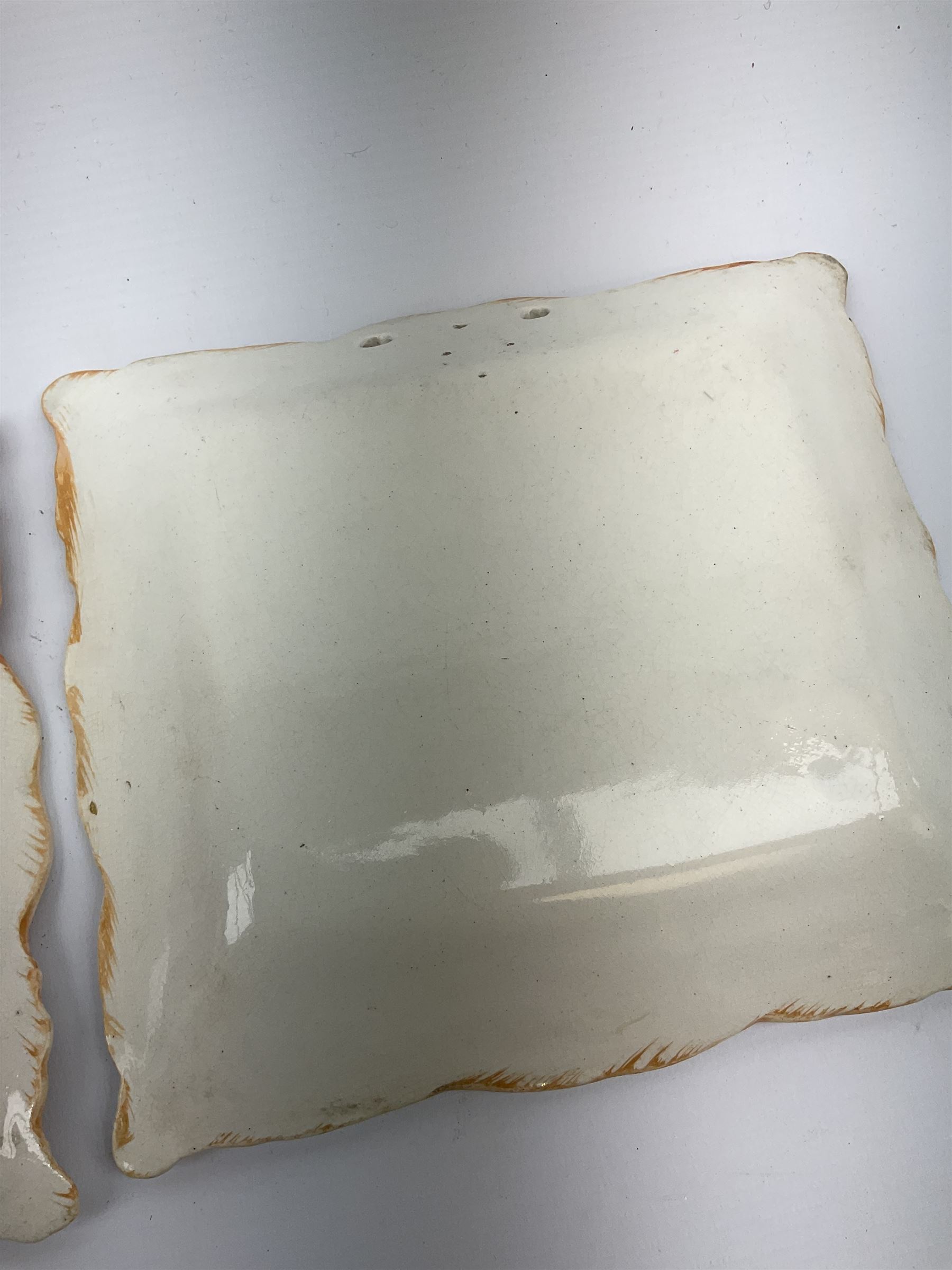 Two 19th century Sunderland orange lustre wall plaques, the first example inscribed Thou God Seest Me, the second example inscribed Prepare To Meet Thy God, H20cm L23cm.