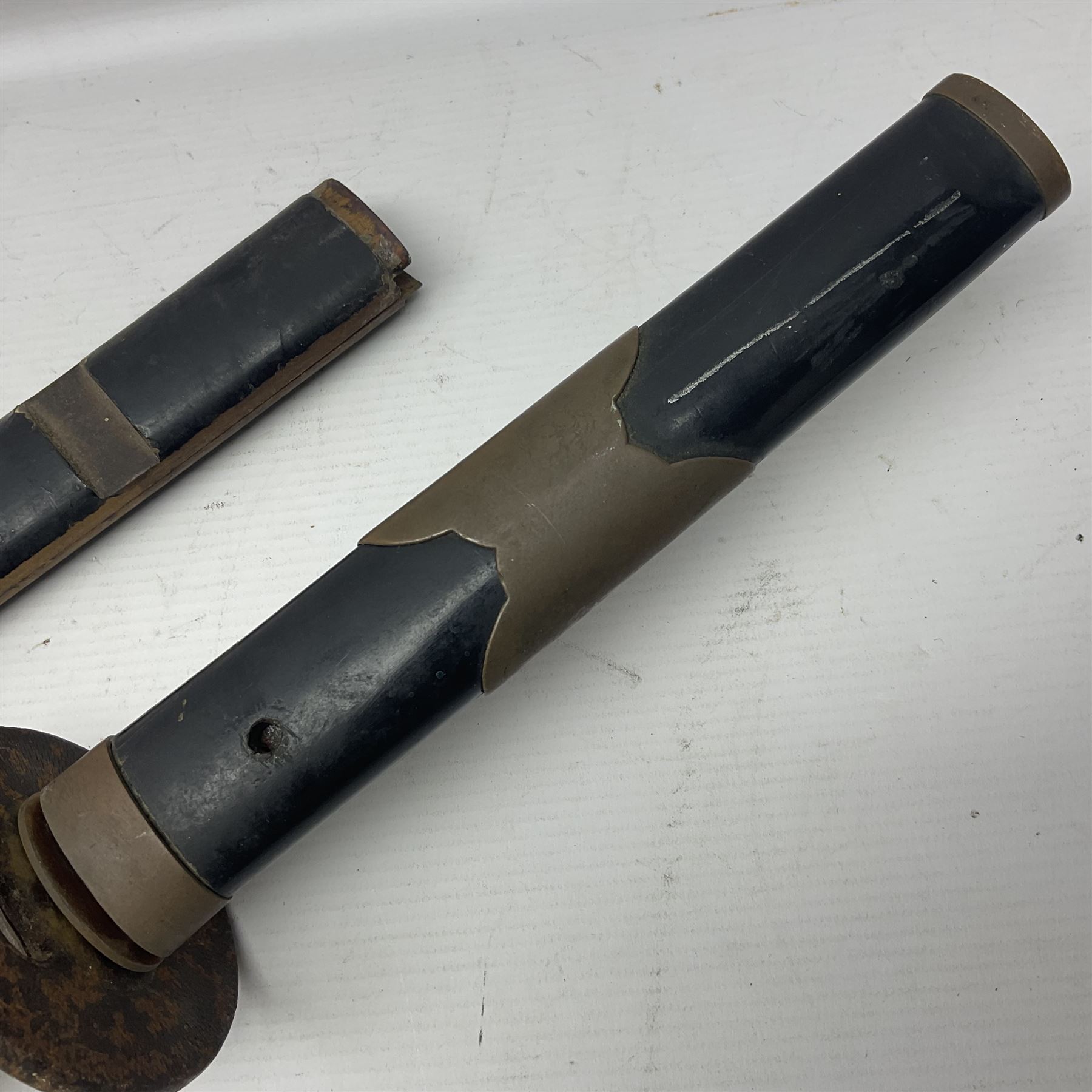 Good quality Japanese sword blade with later WWII fittings and scabbard  - 67.5cm slightly curving blade with unmarked tang, plain iron tsuba and lacquered grip with copper mounts; in lacquered wooden scabbard with tape bound tip L94cm overall