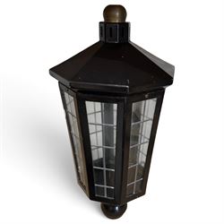 Georgian design black-painted metal octagonal hanging lantern, with brass ball finial above a hipped canopy, astragal glazed lattice panels and pendant ball terminal