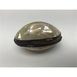 19th century lacquer thimble case with painted portrait of a woman to the hinged lid, together with two mother of pearl egg shaped thimble cases and one other