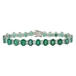 18ct white gold oval emerald and baguette diamond bracelet, stamped 18K, total diamond weight approx 3.50 carat, total emerald weight approx 19.20 carat