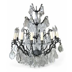 Early 20th century continental cut glass and metal chandelier, with sixteen candle style l...