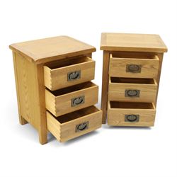Pair of solid light oak bedside chests, rectangular top over three graduating drawers with metal handles and plates, on square feet