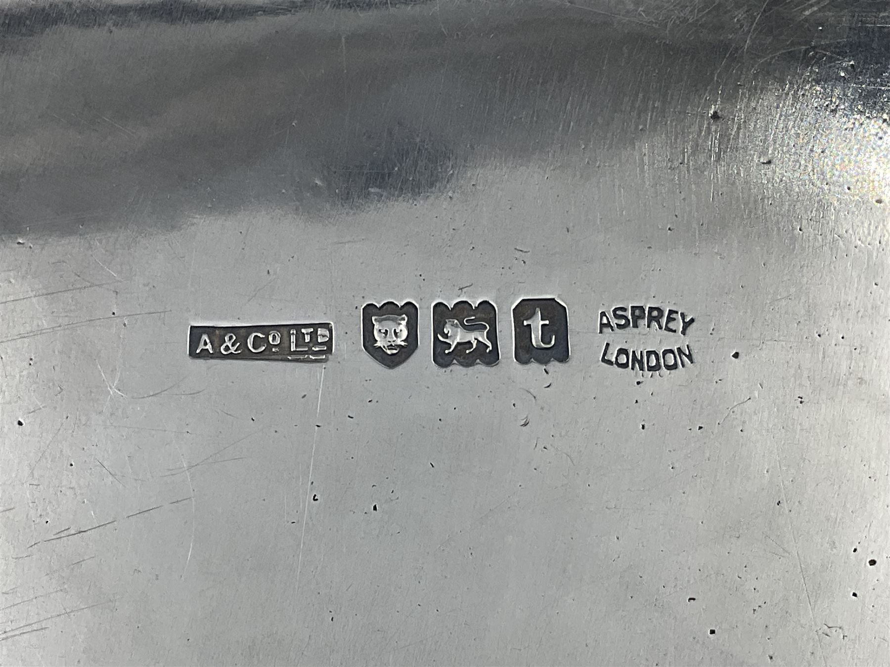 Small early 20th century silver tray, of rectangular form with reeded edge and twin reeded handles, hallmarked Asprey & Co Ltd, London 1914, including handles W26.5cm